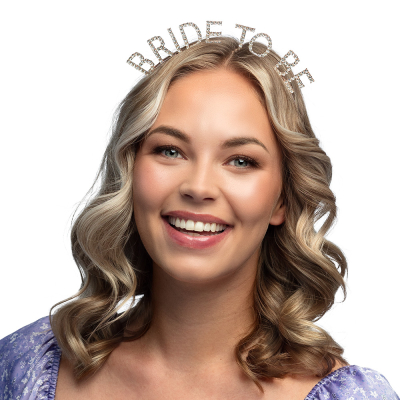 A smiling woman with half-long wavy blonde hair has a shiny tiara on with the text 'Bride to be'.