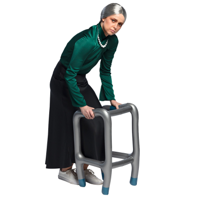 Elderly woman behind an inflatable walking frame.