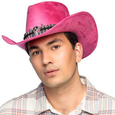 Man with flannel checked shirt has a pink cowboy hat on with a fabric band with wild west pattern and silver bulls head as details.