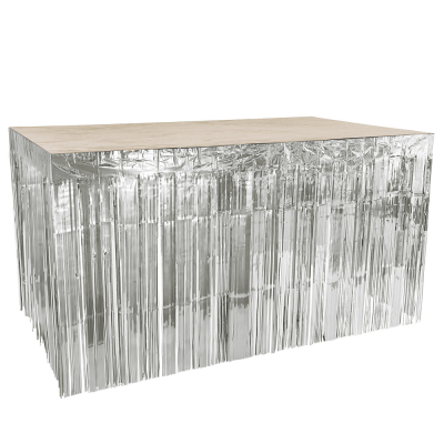 Silver metallic table skirt with frills.