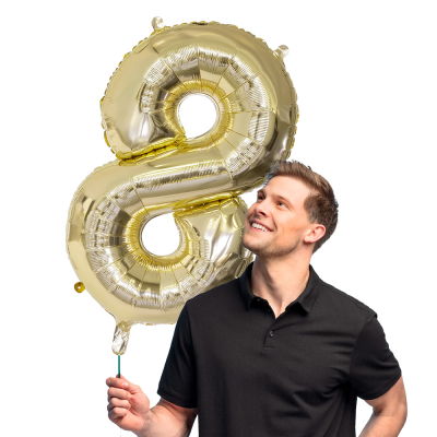 Gold foil balloon in the shape of the numeral 8.
