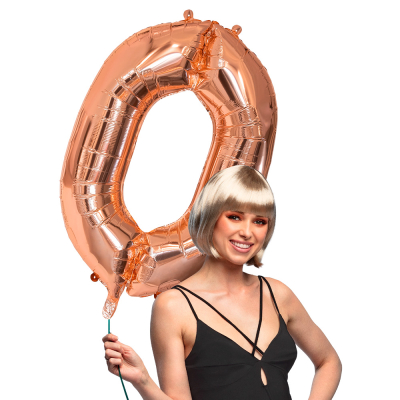 Rose gold foil balloon in the shape of the numeral 0.