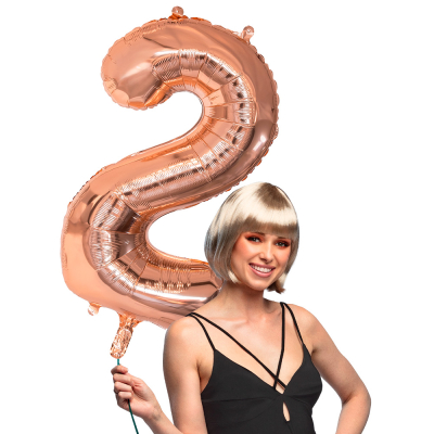 Pink gold foil balloon in the shape of the number 2.