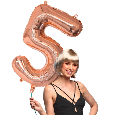 Pink gold foil balloon in the shape of the numeral 5.