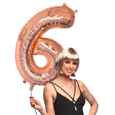 Pink gold foil balloon in the shape of the numeral 6.