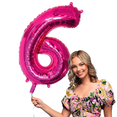 Pink foil balloon in the shape of the numeral 6.