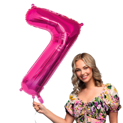 Pink foil balloon in the shape of the numeral 7.