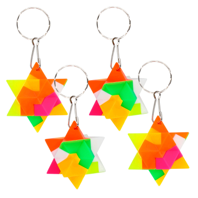 4 puzzel sleutelhanges in de vorm van een ster met elk stukje een andere neon kleur.