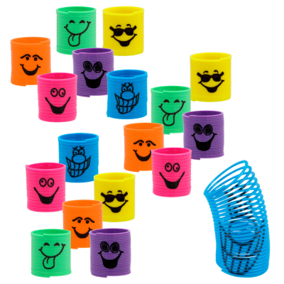 18 glimlachende traplopers met verschillende gezichtjes en kleuren: oranje, roze, geel, groen, paars en blauw.