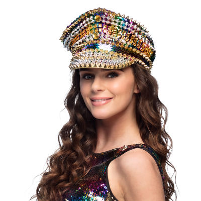 A captain's cap with shiny rainbow sequins and lots of gold and silver spikes and stones.