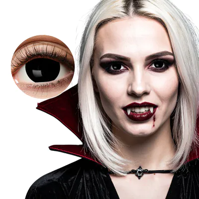 Woman is dressed as a vampire and wears a cape with high collar, has vampire fake teeth in and wears dark, black lenses for an extra creepy look.