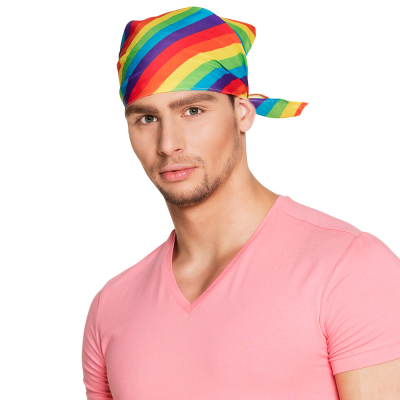 Man wearing a light pink t-shirt wears a bandana in the colours of the rainbow.