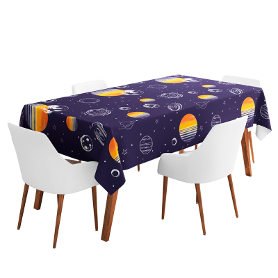 Paper Space tablecloth with print of planets and stars on a dark blue background.