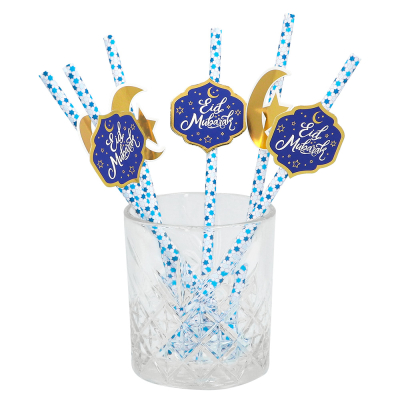 Glass with 3 Blue/white straws with Eid Mubarak decoration and 3 Blue/white straws decorated with a golden moon and star.