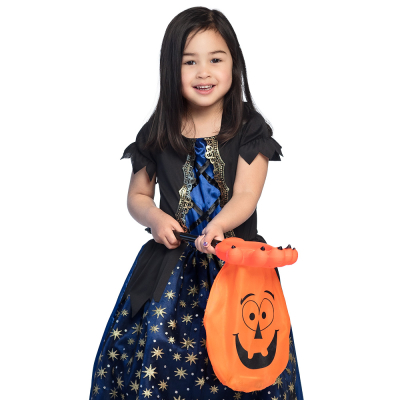 Orange Halloween candy bag for trick or treat with print of a pumpkin face. The bag is attached to a hand with a hole in it and that hand is then attached to a stick. Someone is holding the stick.