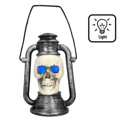 Decorative halloween lantern with a skull with glowing blue eyes.