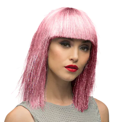 Woman wears a striking pink glitter wig with a mid-length bob and fringe. Perfect as an accessory for a party, carnival, fancy dress party or cosplay.
