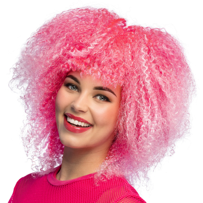 Woman with big pink afro wig - cheerful curls in bright neon pink, ideal for disco parties, carnival, fancy dress party or Pride.