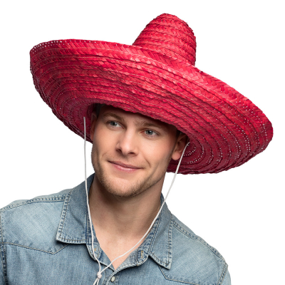 Man wearing a large sombrero hat in red, with drawstring.