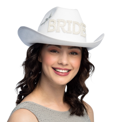 Woman wears a white cowboy hat with the word �BRIDE� in pearl letters and a sparkly dress. Ideal accessory for a bachelorette party, wedding theme, or an eye-catching carnival outfit for the bride in the spotlight.