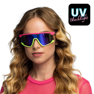 Woman wears futuristic neon pink party glasses with wide mirrored lenses that light up under blacklight. Perfect for raves, carnivals and festivals.