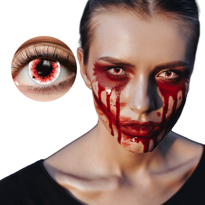 Woman wears creepy Halloween make-up with fake blood around her eyes and mouth and she has contact lenses in with a blood splatter motif for an extra scary Halloween look.