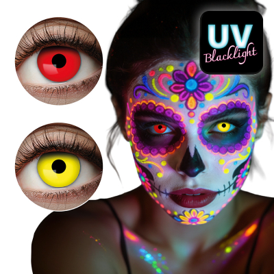 A woman has colourful Day of the Dead UV make-up on her face making her look like a colourful skull where she also wears one yellow and one red UV contact lens for a complete Halloween look.