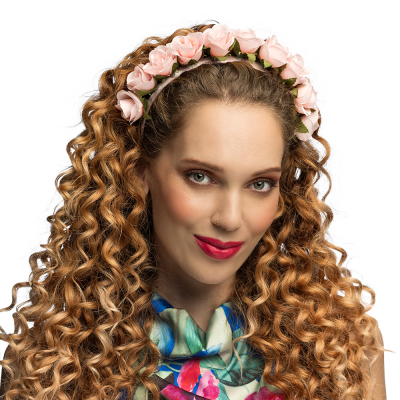 Woman with light pink flowers diadem - romantic accessory for festivals, weddings, fancy dress parties and summer parties.