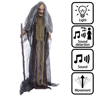 An animated Halloween decoration of a witch with a long robe, walking stick and long white hair, which is activated by sound, has red glowing eyes and makes spooky sounds and movements.