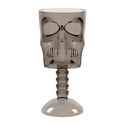 A plastic Halloween drinking cup with a skull design on a high leg and a smokey grey colour.