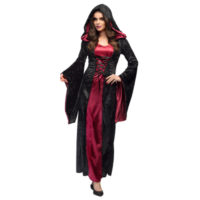 Woman wearing long black and red Halloween vampire dress with long, wide sleeves. 
