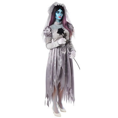 A teenage girl has blue make-up on and is wearing a zombie bride Halloween costume consisting of a worn white wedding dress with long sleeves and lace details and a matching tiara with veil.