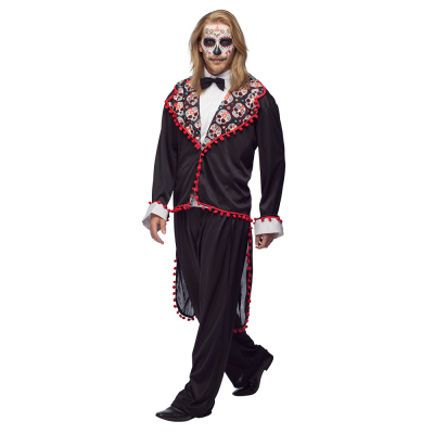 A man wears a Day of the Dead Halloween costume consisting of long black trousers, a white plastron and a black jacket with a long back decorated with colourful skulls and red polka dots.