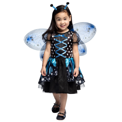 Toddler wearing a black/blue butterfly costume with wings and a tiara with feelers.