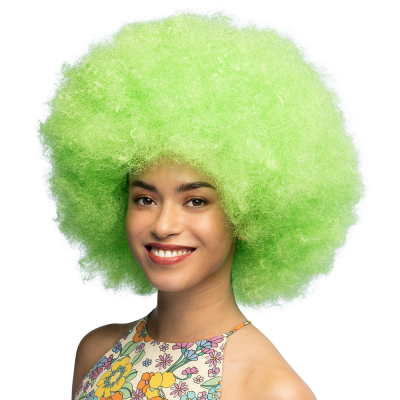 Woman wears a large, full neon green afro wig as an accessory for a neon fancy dress party, disco fancy dress party or colourful carnival costume.