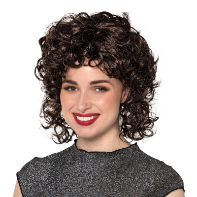 A woman wears a dark brown, mid-length curly wig in a retro 80s style.