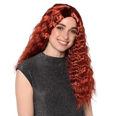 A woman wears a long, wavy copper red wig.
