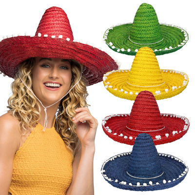 Smiling woman wears a red sombrero of 50 cm diameter with white pompoms along the edge. Additional sombreros in green, yellow, red and blue are visible on the right of the image.